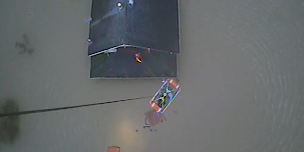 Watch: Coast Guard rescues 4 trapped in Washington home's attic during devastating flooding