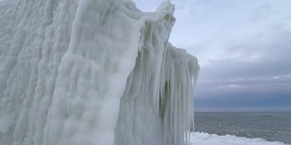 Eerie sight: Bitter cold transforms Michigan lighthouse into 'ice monster'