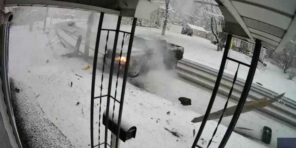 Watch: Driver crashes into pole amid icy roads from powerful Northeast snowstorm