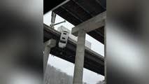Must-watch: Truck driver rescued dangling off West Virginia highway 100-feet above the ground below