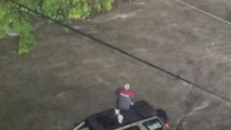 See it: First responders rescue Washington man from roof of SUV, amid historic flooding
