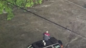 See it: First responders rescue Washington man from roof of SUV, amid historic flooding