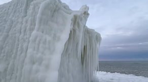 Eerie sight: Bitter cold transforms Michigan lighthouse into 'ice monster'