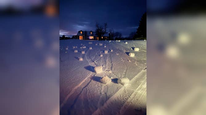 Snow rollers formed in a yard in Suttons Bay, Michigan, on Dec. 16, 2025.