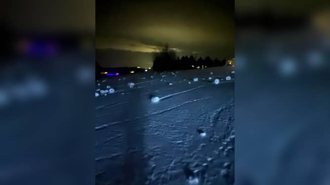 Snow rollers formed in a yard in Suttons Bay, Michigan, on Dec. 16, 2025.