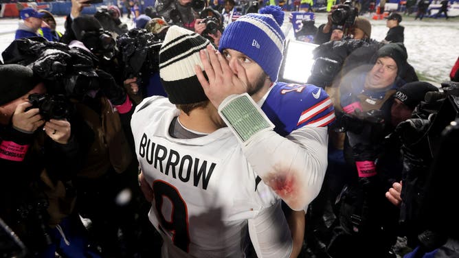 ORCHARD PARK, NEW YORK - JANUARY 22: Josh Allen #17 of the Buffalo Bills talks with Joe Burrow #9 of the Cincinnati Bengals after the AFC Divisional Playoff game at Highmark Stadium on January 22, 2023 in Orchard Park, New York. The Cincinnati Bengals defeated the Buffalo Bills with a score of 27 to 10.