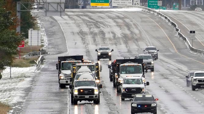 SPRING, TEXAS - JANUARY 21: Road crews spray a brine solution along I-45 north bound near Loretta Rd. Tuesday, Jan. 21, 2025, in Spring. (Melissa Phillip/Houston Chronicle via Getty Images)