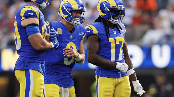 INGLEWOOD, CALIFORNIA - NOVEMBER 02: Matthew Stafford #9 of the Los Angeles Rams and Davante Adams #17 interact during the second quarter of an NFL football game against the New Orleans Saints at SoFi Stadium on November 02, 2025 in Inglewood, California.