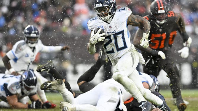 CLEVELAND, OHIO - DECEMBER 07: Tony Pollard #20 of the Tennessee Titans runs for a touchdown during the third quarter against the Cleveland Browns at Huntington Bank Field on December 07, 2025 in Cleveland, Ohio.
