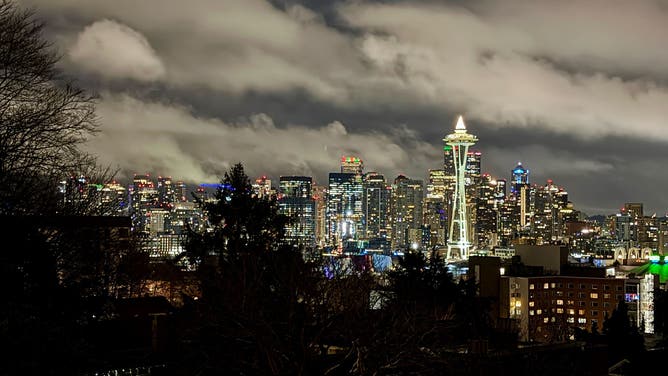 Ominous clouds loom over Seattle on Tuesday, Dec. 16, 2025, as latest atmospheric river begins to intensify.