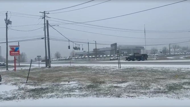 Snow partially covers roads in Newburgh, New York on Tuesday morning, Dec. 2, 2025.