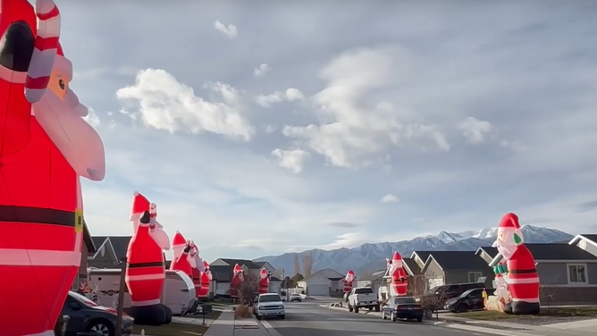 More than 80 identical giant inflatable Christmas lawn decorations took over a Utah neighborhood ahead of the holiday.