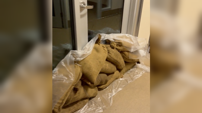Sandbags piled in front of the doors of Everett Animal Shelter in Everett, Washington after evacuating animals to temporary fosters in case of flooding.