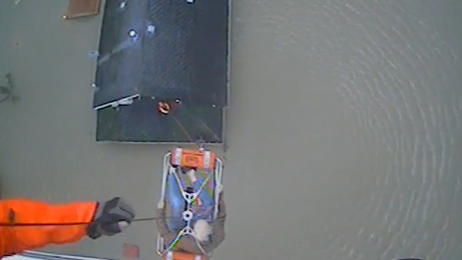 The second person was hoisted into the helicopter,