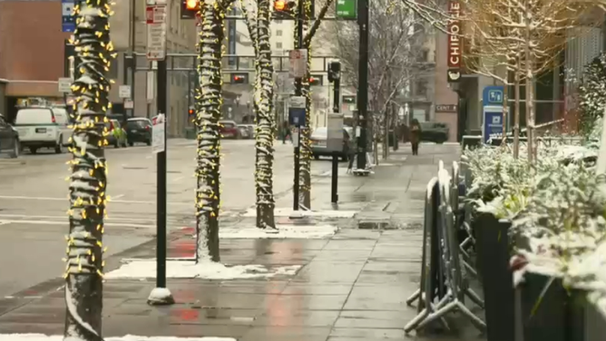 Snow begins to fall across Cincinnati on Friday, Dec. 12, 2025, public schools were canceled.