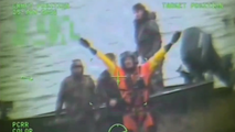 See it: US Coast Guard rescues three stranded duck hunters in dangerous severe weather