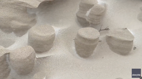 Watch: Sands on Lake Michigan beach freeze into unique mini sculptures