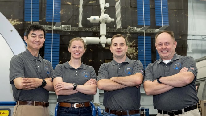 NASA’s SpaceX Crew-11 members stand inside the Space Vehicle Mockup Facility at the agency’s Johnson Space Center in Houston. From left are Mission Specialist Kimiya Yui from JAXA (Japan Aerospace Exploration Agency), Commander NASA astronaut Zena Cardman, Mission Specialist Oleg Platonov of Roscosmos, and Pilot NASA astronaut Mike Fincke.
