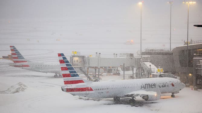 A Boeing 737 American Airlines passenger aircraft is parked at gate on the tarmac of LaGuardia airport in New York on January 25, 2026.