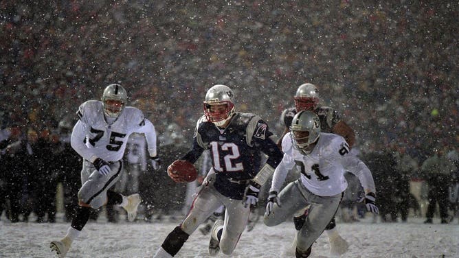 Football: NFL Playoffs: New England Patriots QB Tom Brady (12) in action, scoring touchdown vs Oakland Raiders at Foxboro Stadium.