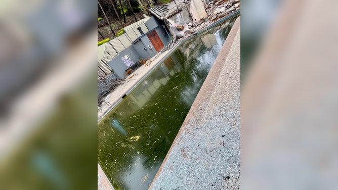 Piles of damage left behind from the Palisades wildfire.