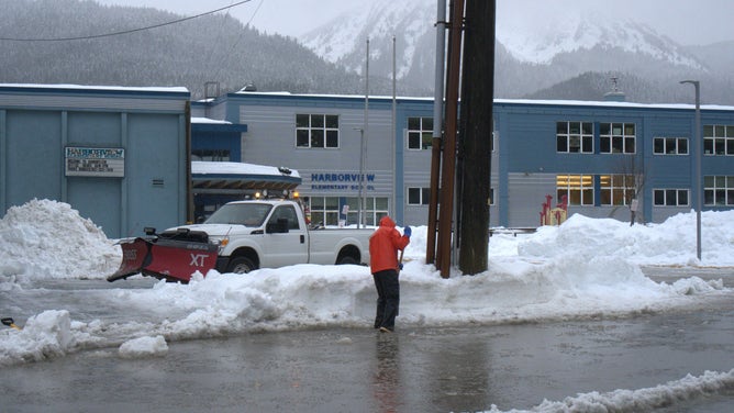 Juneau is digging out after days of heavy rain from an atmospheric river melted more than 7 feet of snow that fell across the Alaska Panhandle between Christmas Eve and New Year's, triggering avalanches and evacuations around the state's capital.