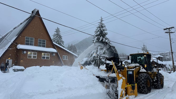 Juneau is digging out after days of heavy rain from an atmospheric river melted more than 7 feet of snow that fell across the Alaska Panhandle between Christmas Eve and New Year's, triggering avalanches and evacuations around the state's capital.