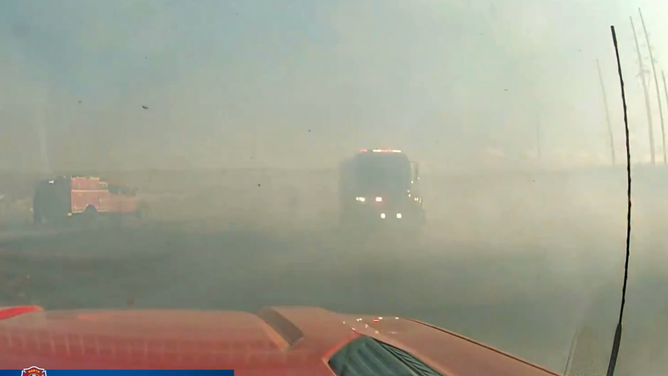 Smoke from a small Colorado wildfire blocks visibility almost entirely.