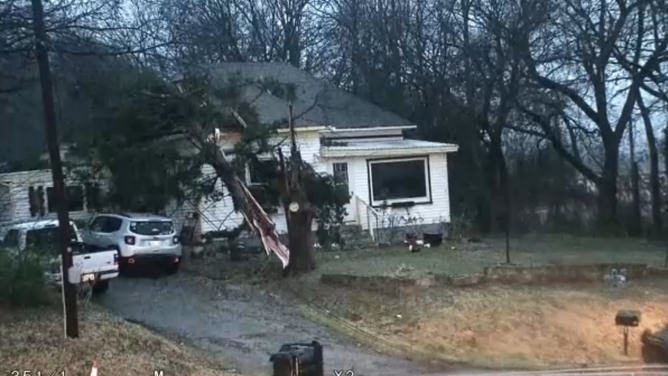 A radar-confirmed tornado ripped across Interstate 35 and part of Purcell, Oklahoma Thursday morning, knocking down power lines as a powerful line of thunderstorms barreled their way across the Southern Plains.