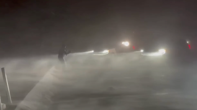 FOX Weather Correspondent Robert Ray reports during the thick of a lake-effect snow band slamming Benton Harbor, Michigan, on Jan. 14, 2026.