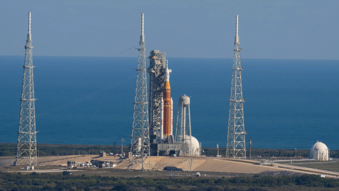 NASA’s Artemis II SLS (Space Launch System) rocket with the Orion spacecraft atop a mobile launcher is seen at Launch Complex 39B, Thursday, Jan. 29, 2026, at NASA’s Kennedy Space Center in Florida. The Artemis II test flight will take Commander Reid Wiseman, Pilot Victor Glover, and Mission Specialist Christina Koch from NASA, and Mission Specialist Jeremy Hansen from the CSA (Canadian Space Agency), around the Moon and back to Earth.