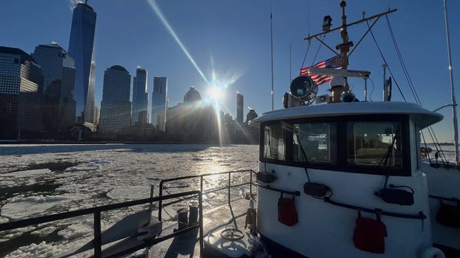 U.S. Coast Guard cutters are busy trying to keep New York's iced-over waterways moving, including freeing an NYPD Harbor Unit vessel that was beset by ice floes Tuesday.