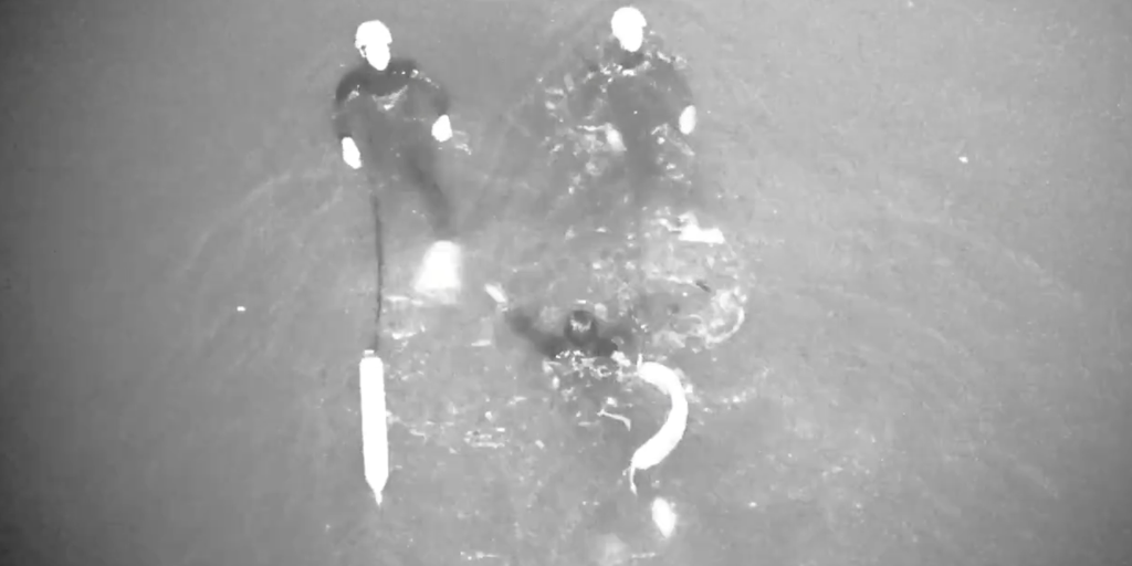 Daring rescue: Surfer clings to lobster trap buoy after being swept away from shore