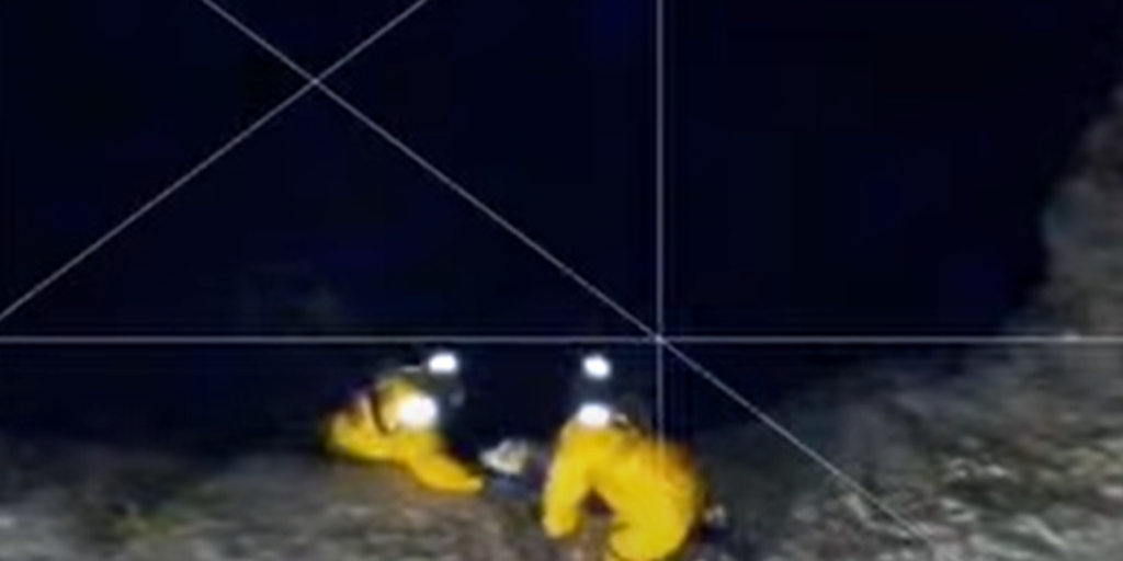 See it: Massachusetts firefighters slide into frozen pond to rescue trapped dog