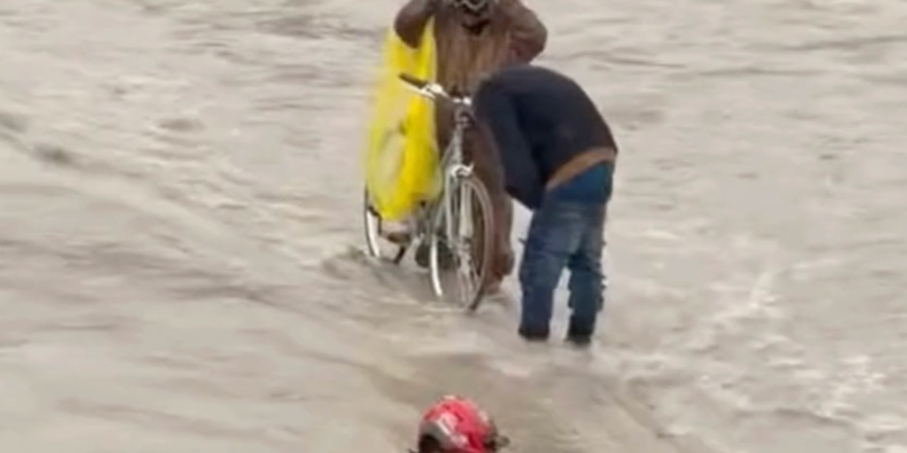 Watch: Firefighters rescue two men caught in rising Texas creek waters amid severe weather across the South