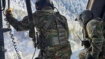 Photos: Tennessee National Guard use Black Hawk helicopter to rescue injured hiker in snowy mountain