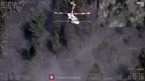 Video: Woman rescued from bushfire after waving down helicopter with towel