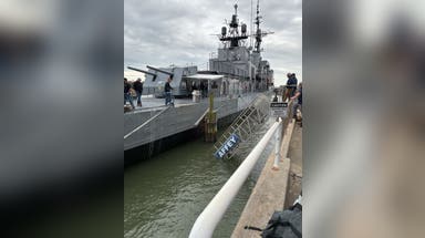 30 people rescued from World War II destroyer after walkway collapses into water in South Carolina