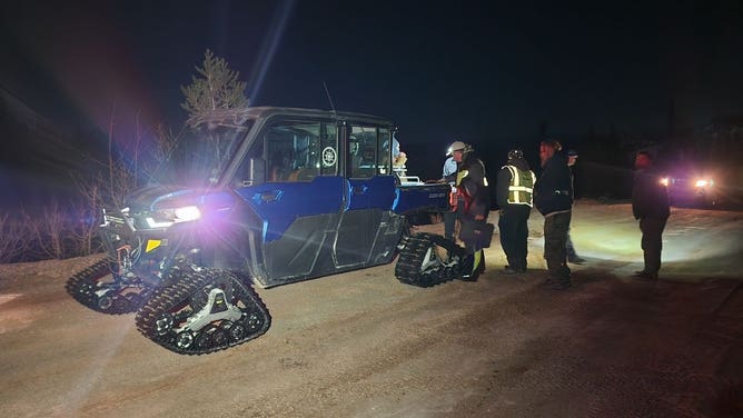 The Iron County Search and Rescue Team used snowmobiles to reach four stranded travelers after they became stuck in heavy snow.