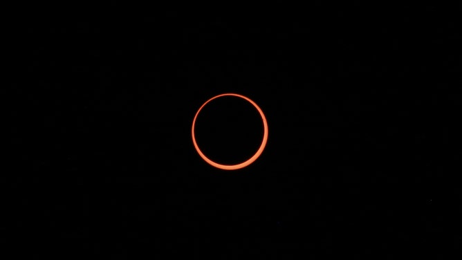 The "ring of fire" eclipse is pictured in Easter Island in the Pacific Ocean, Chile, on October 2, 2024.