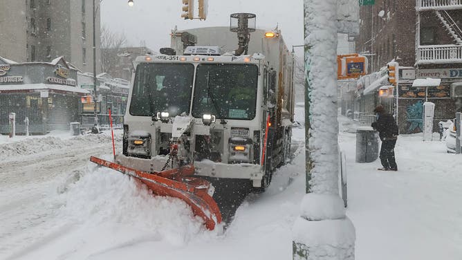 A snow plow during a winter storm in the Brooklyn borough of New York, US, on Monday, Feb. 23, 2026.