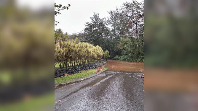 Maui County shared images of localized flooding and debris slides on Sunday and shelters were set up across the islands in case flood conditions worsened.