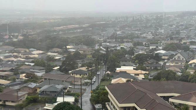 Maui County shared images of localized flooding and debris slides on Sunday and shelters were set up across the islands in case flood conditions worsened.