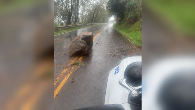 Maui County shared images of localized flooding and debris slides on Sunday and shelters were set up across the islands in case flood conditions worsened.