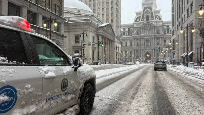 Philadelphia cleans up roads after major blizzard.