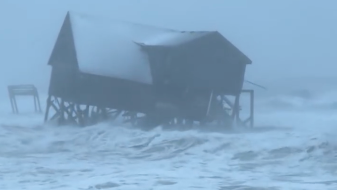 Beach house in Buxton, North Carolina, collapses into the ocean during rough beach conditions during a nor'easter on Feb. 1, 2026. 
