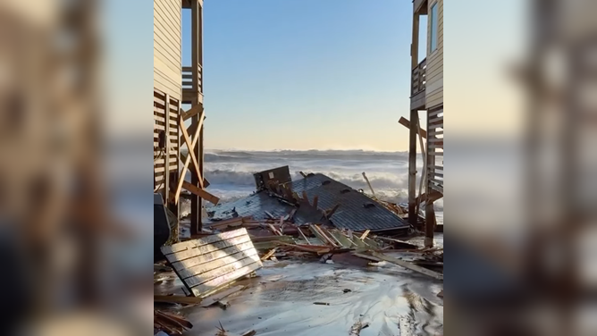 Home collapses in Buxton, North Carolina amid powerful nor'easter.