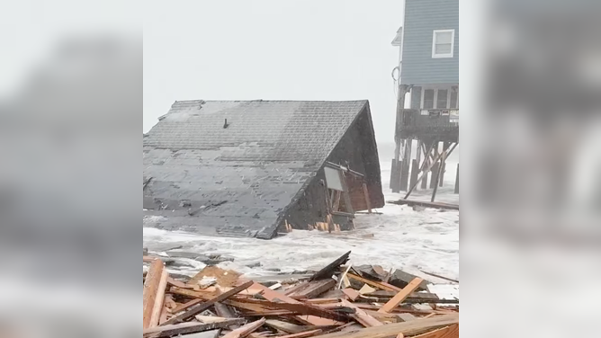 Home collapses in Buxton, North Carolina amid powerful nor'easter.