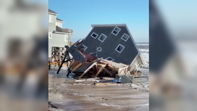 Home collapses in Buxton, North Carolina amid powerful nor'easter.