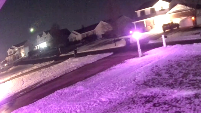 The fireball illuminates the sky in a neighborhood in Saint Clairsville, Ohio on Tuesday.